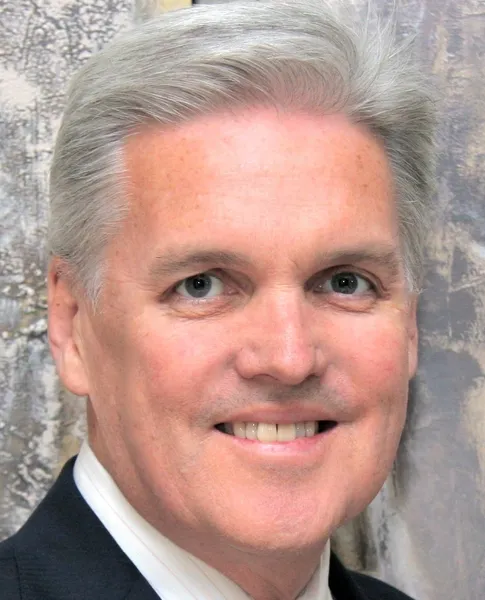 Professional headshot of young business consultant at Revenue Sage